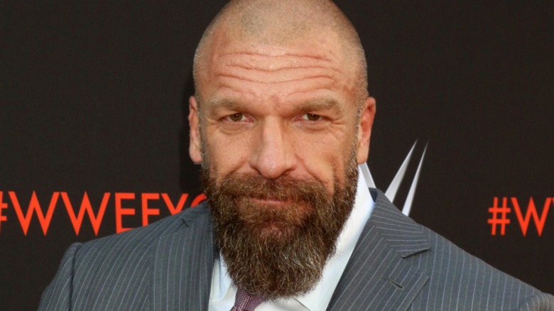 Triple H with a smirk