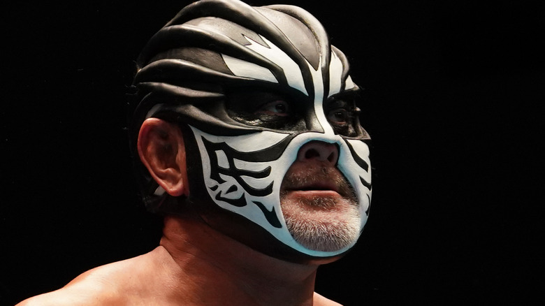 The Great Muta looking away