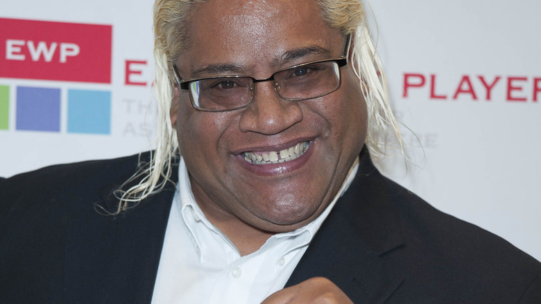 Rikishi smiling