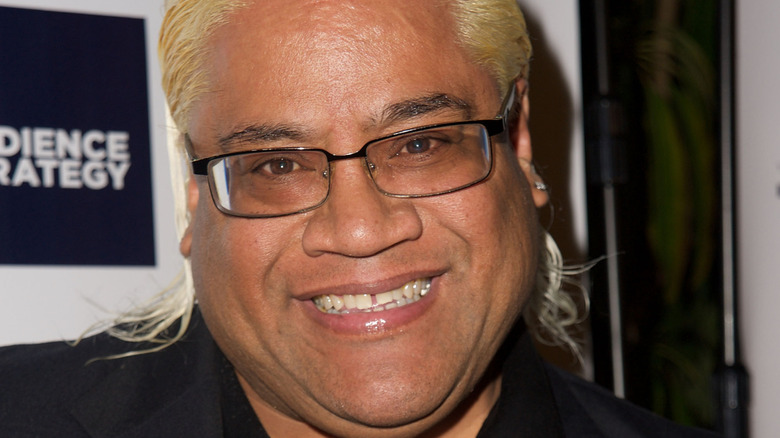 Rikishi smiling