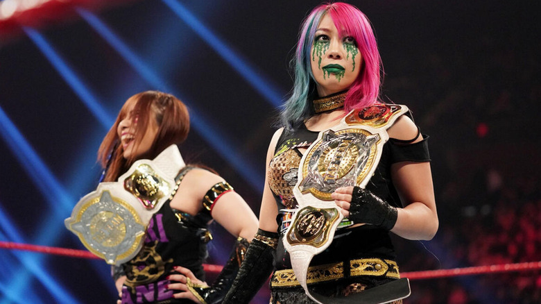 The Kabuki Warriors holding the Women's Tag Team titles