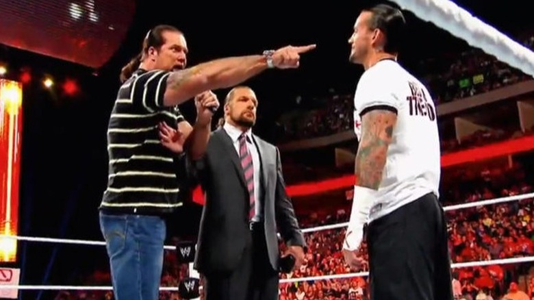 Kevin Nash pointing at Punk