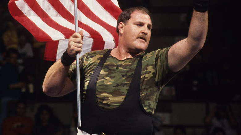 Sgt. Slaughter waving the red, white & blue (circa 1992)
