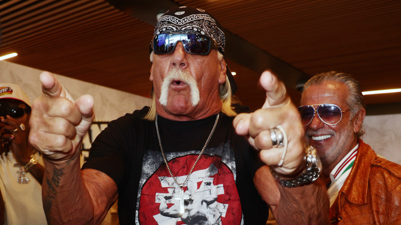 Hulk Hogan mugs for the camera