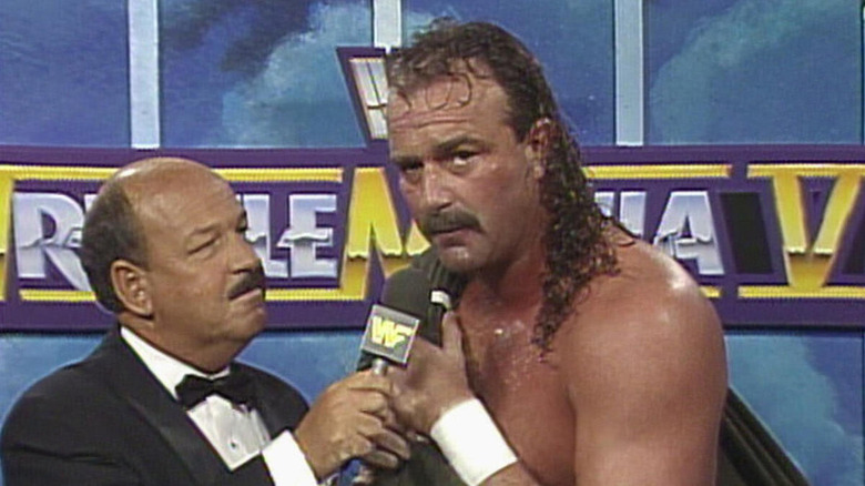 "Mean" Gene Okerlund interviews Jake "The Snake" Roberts