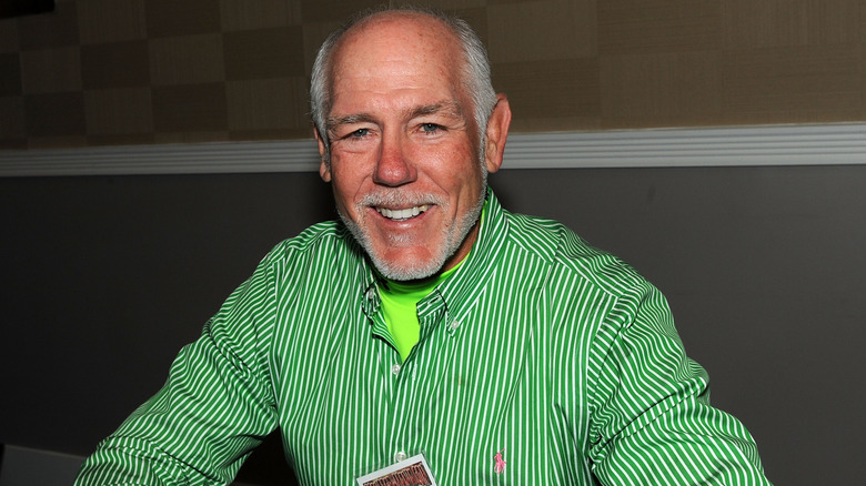 Tully Blanchard posing for photo at a convention