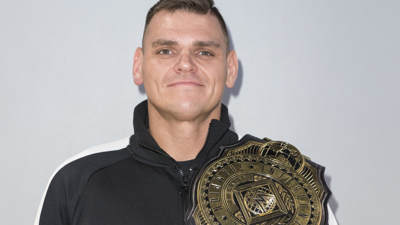 GUNTHER smiles with the Intercontinental Championship