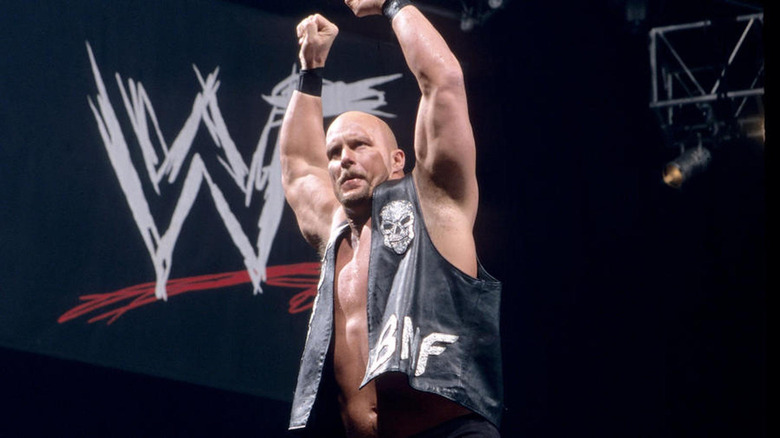 "Stone Cold" Steve Austin throws up his arms