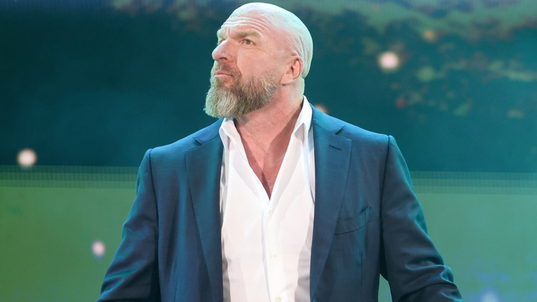 Triple H wearing a suit