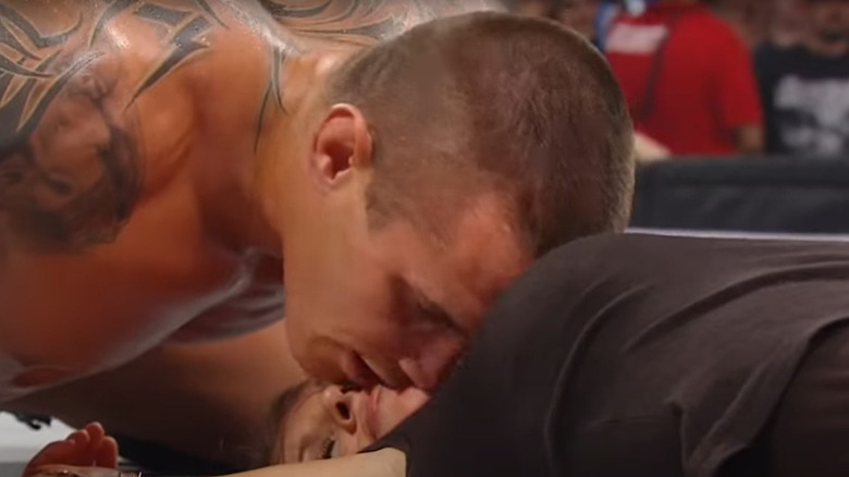 Randy Orton kisses an unconscious Stepahnie McMahon