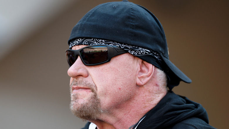 The Undertaker thinking about that cold West Virginia night with the Iron Sheik