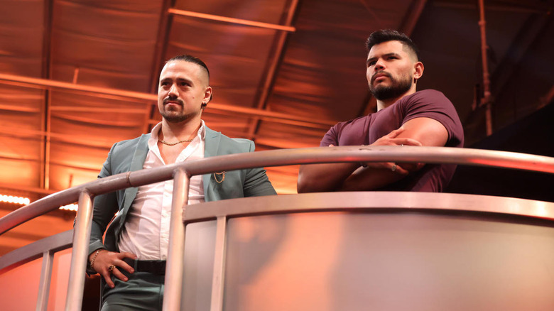 Angel Garza and Humberto Carrillo on a balcony