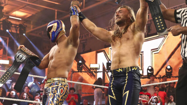 Axiom and Nathan Frazer holding the NXT Tag Team Championships