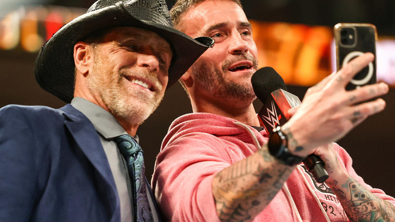 CM Punk takes a selfie with Shawn Michaels