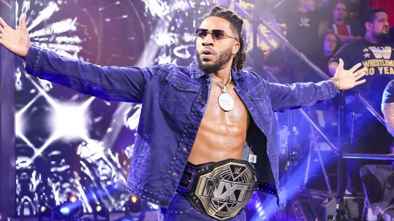 NXT Champion Trick Williams heads down the ramp to the wearing, wearing his title, before a confrontation with Ridge Holland on "WWE NXT."