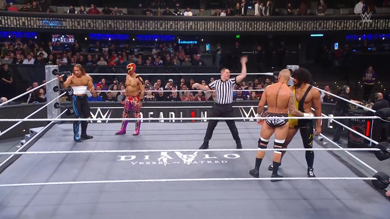 The four competitors in the ring