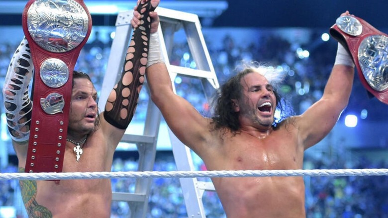 Matt and Jeff Hardy hold up their newly won WWE Tag Team Championships after winning a ladder match post-surprise return at WrestleMania 33.