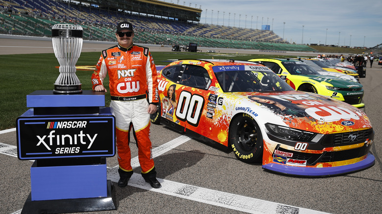 Cole Custer poses with his No. 00 "NXT on CW" car