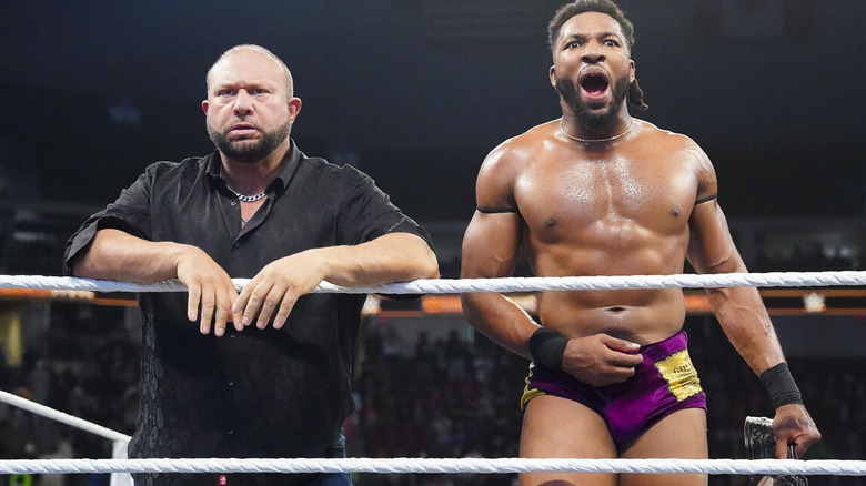 Bully Ray stands beside Trick Williams at "WWE NXT" Halloween Havoc.