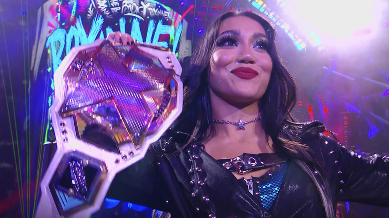 Perez holding up the NXT Women's Championship