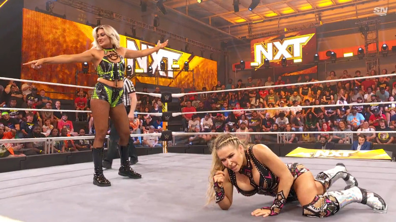 Natalya and Dame in the ring