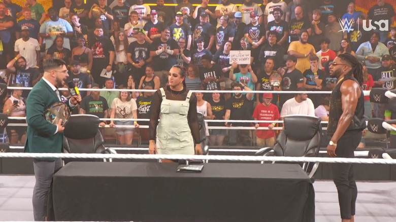 Page, Ava, and Williams in the ring