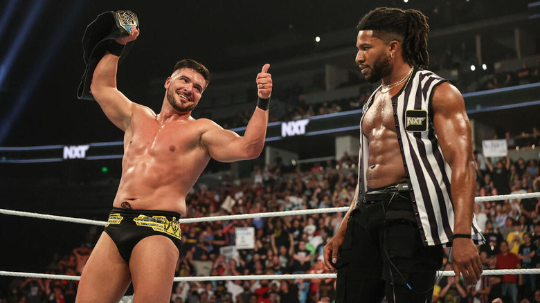 Ethan Page gives Trick Williams thumbs up