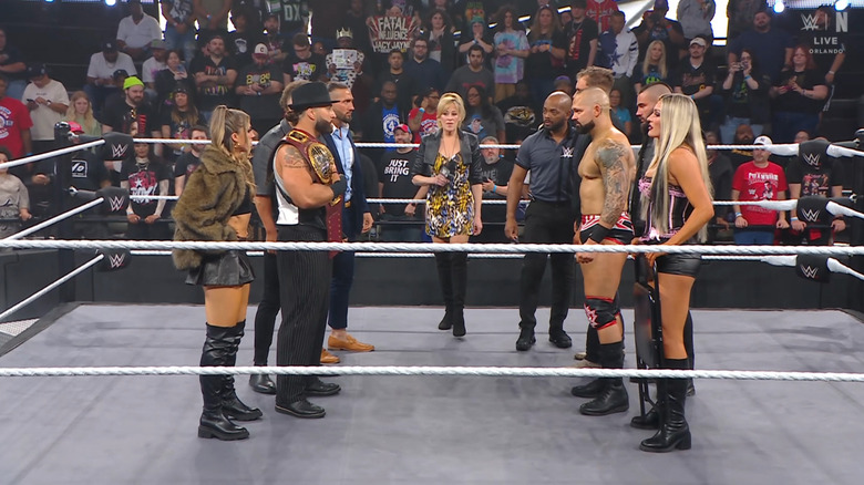 The Family, Spears, Dame, Jensen, and Vance in the ring