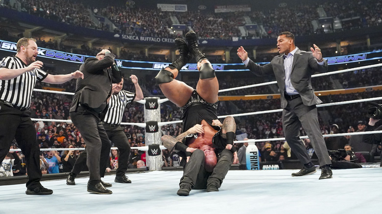 Kevin Owens hits a piledriver on Randy Orton