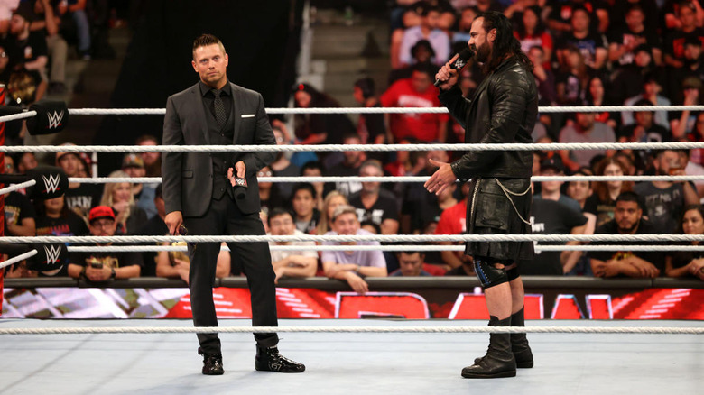 The Miz and Drew McIntyre with microphones