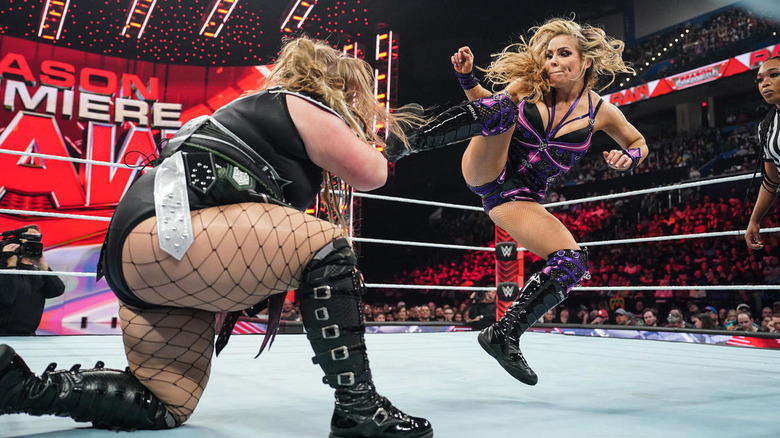 Natalya kicks Piper Niven