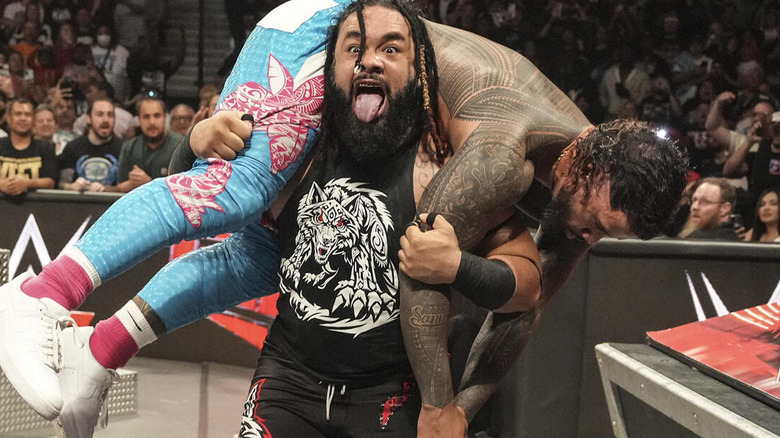 Jacob Fatu with Jey Uso on his shoulders