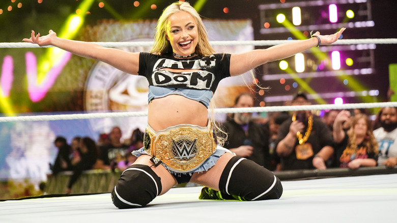 Liv Morgan poses in the ring during her entrance on "WWE Raw"