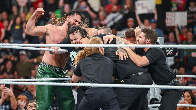 Seth Rollins and Bronson Reed brawl in the ring while security tries to break it up on "WWE Raw"