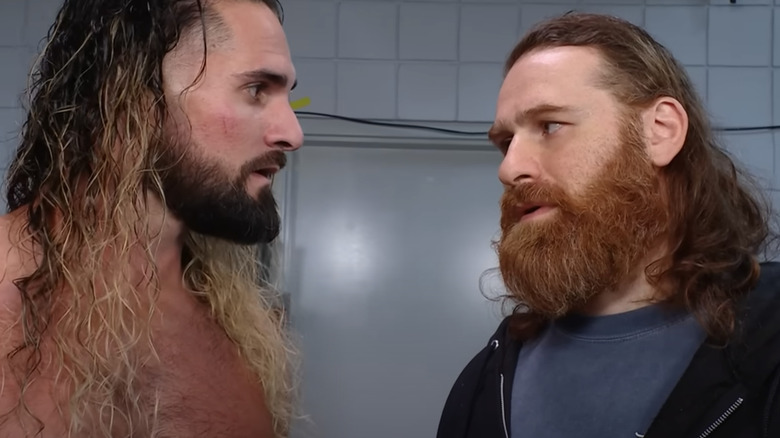 Seth Rollins talking to Sami Zayn backstage on "WWE Raw."