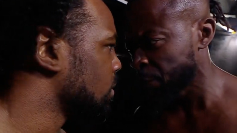 Xavier Woods and Kofi Kingston stand nose to nose in anger backstage on "WWE Raw."