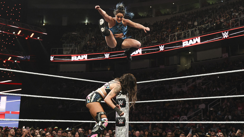 Lyra Valkyria comes off the top rope to drop a leg on Dakota Kai on "WWE Raw"