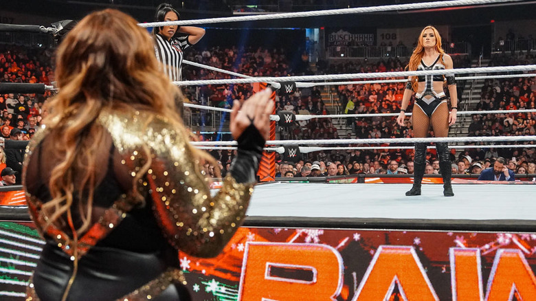 Nia Jax confronting Becky Lynch in the ring