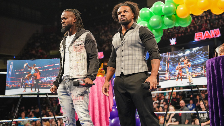 Kofi Kingston and Xavier Woods standing in the ring on "WWE Raw.