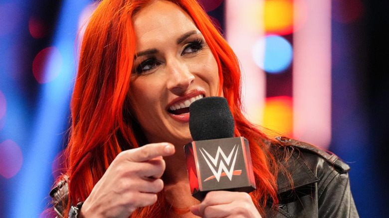 Becky Lynch talking into a microphone