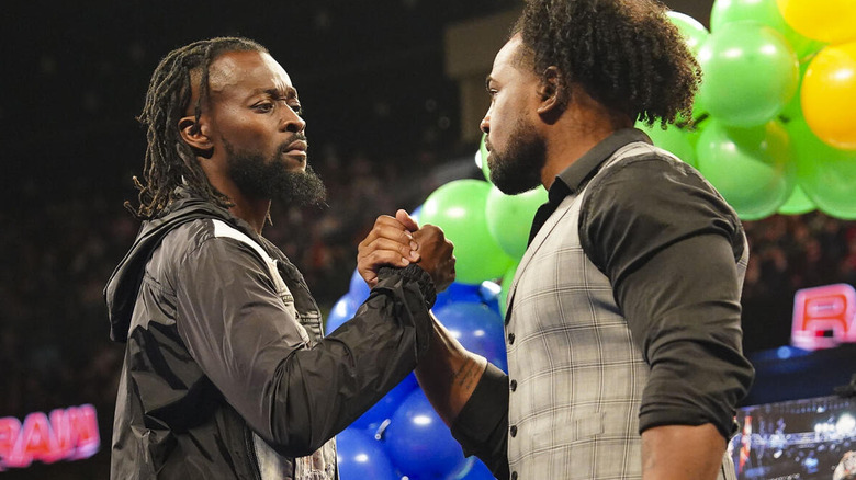 Kofi Kingston and Xavier Woods clasp hands on "WWE Raw.