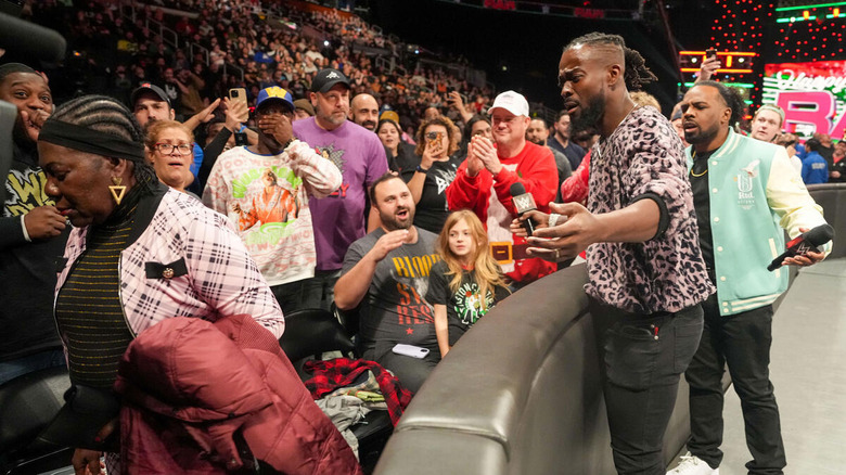 Kofi Kingston's mom walks away from him and Xavier Woods through the crowd on "WWE Raw."