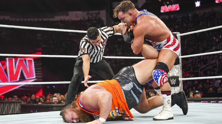 Chad Gable cinches in an Ankle Lock on Otis