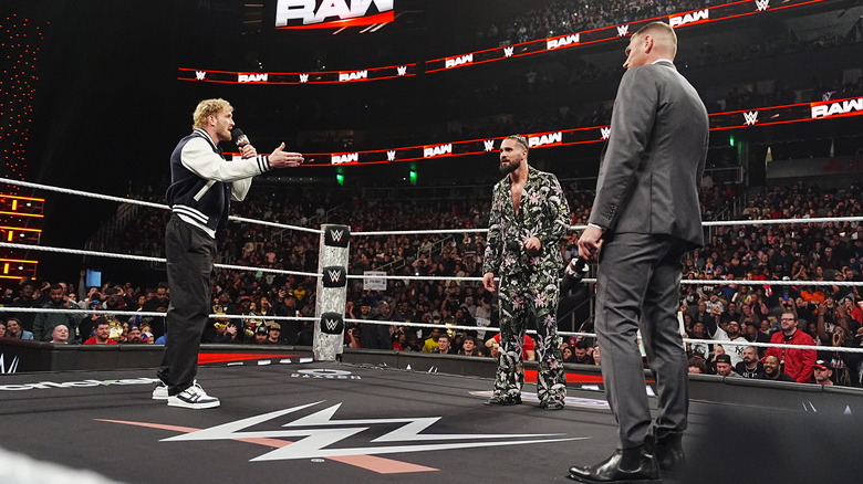 Seth Rollis faces off with GUNTHER and Logan Paul n the ring on "WWE Raw"