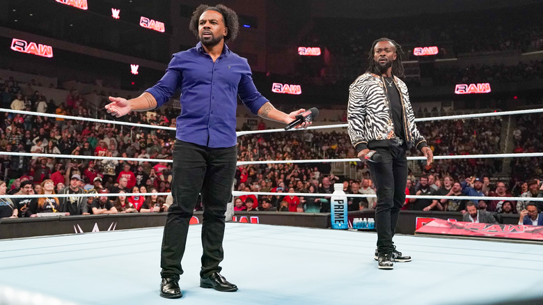 The New Day looking shocked and appalled and the crowd's reaction to them in the ring on "WWE Raw."