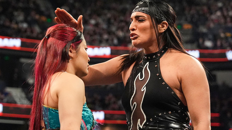 Raquel Rodriguez pats IYO SKY's head during a match on "WWE Raw"