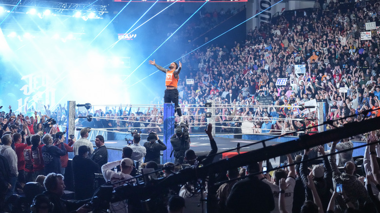 Jey Uso stands on the turnbuckle with his arms out to the crowd on "WWE Raw"