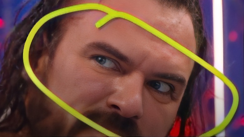 Drew McIntyre's eyes circled with a bright yellow overlay