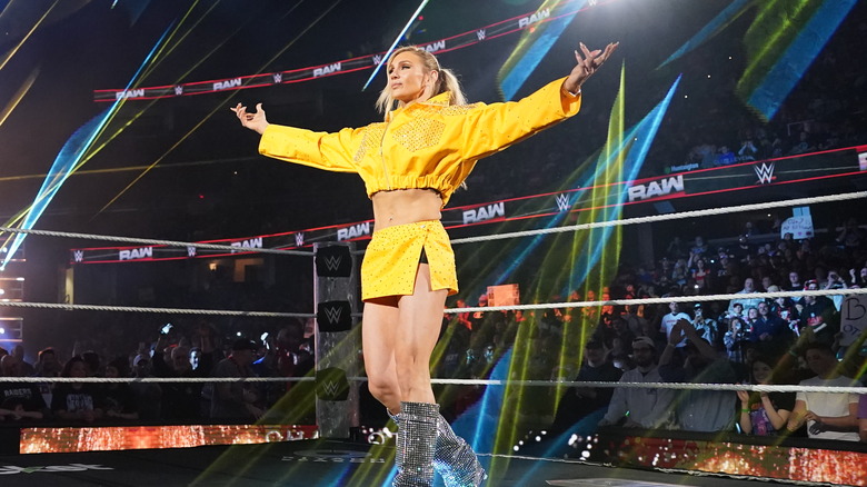 Charlotte Flair poses in the ring on "WWE Raw."