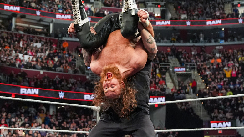 Kevin Owens hitting Sami Zayn with package piledriver on "WWE Raw."